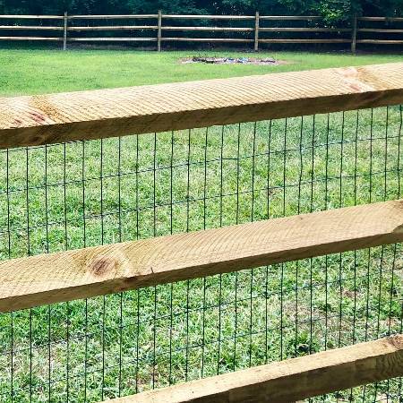 cedar split rail fence with vinyl coated wire | farm fencing bucks county pa
